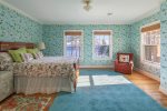 Second floor bedroom with attached bathroom with Sebago Lake views.